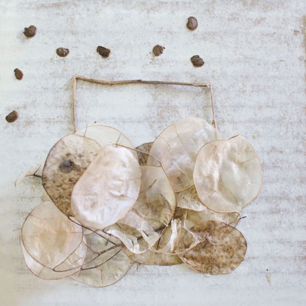 an off-white Covid Purse by Heather Boersma, made of natural materials